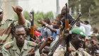 Crowds cheer as soldiers parade in vehicles along the Boulevard de l'Independance in Bamako, Mali on Tuesday.