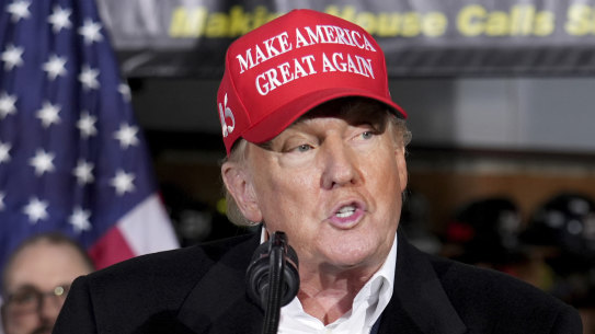 Former US president Donald Trump speaks at the East Palestine Fire Department as he visits the area in the aftermath of the Norfolk Southern train derailment.