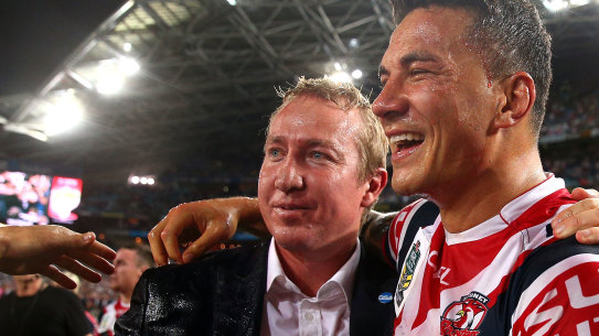 Sonny Bill Williams with Roosters coach Trent Robinson after the 2013 grand final.