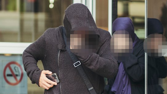 The 15-year-old boy’s parents leave Parramatta Children’s Court after their son’s bail application.