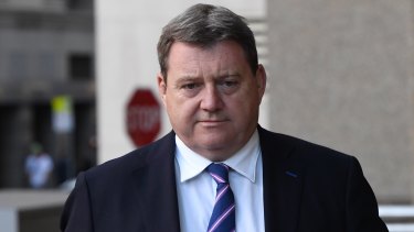 Strong support: Melbourne chairman Bart Campbell arrives at the Federal Court, where he backed the NRL's stance on player behaviour.