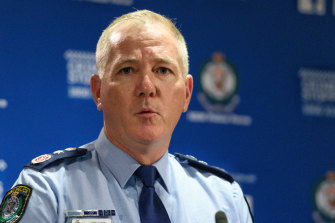 NSW Police Commissioner Mick Fuller struggled to clearly explain the current COVID-19 restrictions in NSW at a parliamentary hearing.