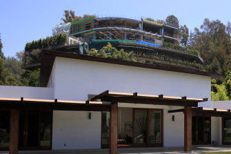 Hadid's 'Starship Enterprise' home (rear) has been judged to be a threat to others in the Bel-Air neighborhood.