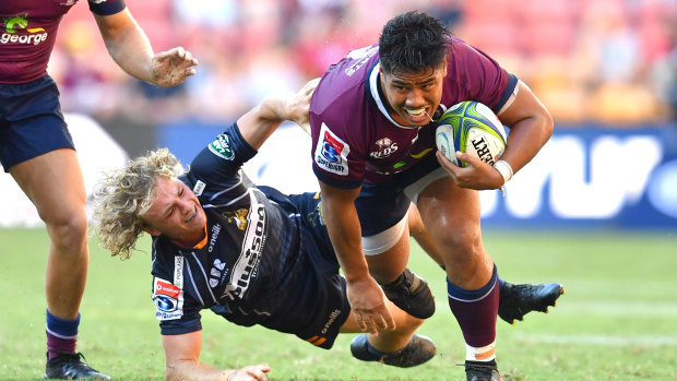 Alex Mafi barges past Joe Powell.