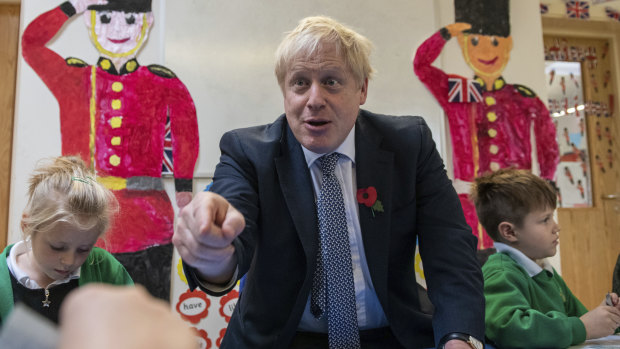 Boris Johnson in election mode at a primary school. 