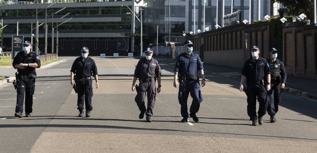 Police patrol at the SCG as gates open for an Australia v India Test in January 2021 during the COVID-19 pandemic. Crowd members who did not wear a mask faced a $1000 fine.