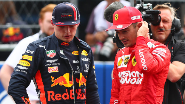 Max Verstappen talks with Charles Leclerc after qualifying.