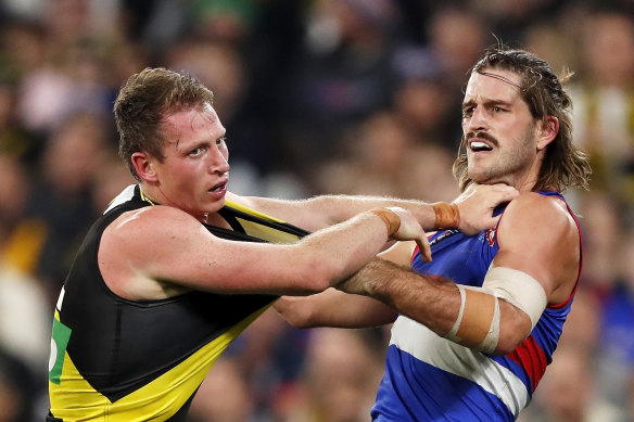 Dylan Grimes, left, has suffered from concussion symptoms. 