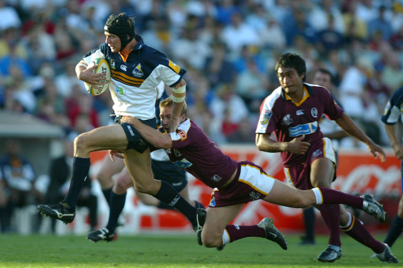 Stephen Larkham in action for the Brumbies.