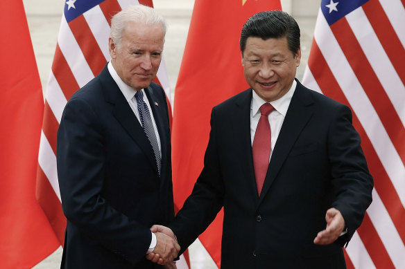 Joe Biden, now US President, shakes hands with Xi Jinping in 2013 when Biden served as Barack Obama’s vice-president.