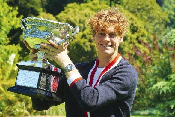 Jannik Sinner basks in the glory of his Australian Open win in Melbourne’s Royal Botanic Gardens on Monday.