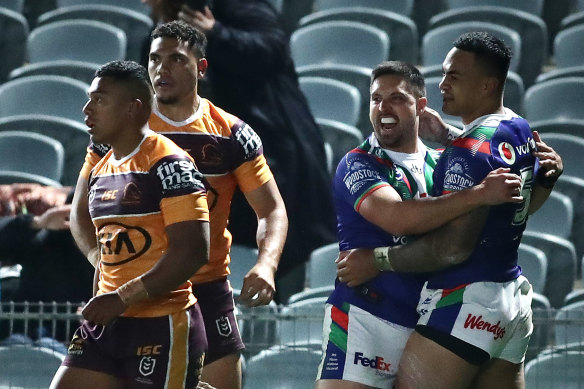 Ken Maumalo of the Warriors celebrates after scoring a try 