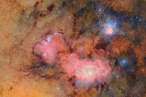 This image, comprised of 678 separate images taken by NSF–DOE Vera C. Rubin Observatory in just over seven hours of observing time, shows the Trifid nebula (top) and Lagoon nebula, both of which are thousands of light years away from Earth.