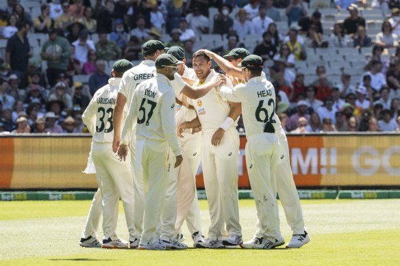 The MCG crowd was raucous in supporting Victorian Scott Boland, who was mobbed by teammates after the last of his six wickets on debut. 