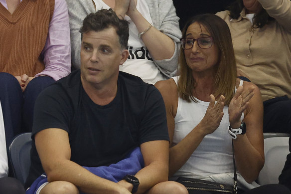 Hayley Lewis and husband Greg Taylor watch their son Kai in Melbourne.