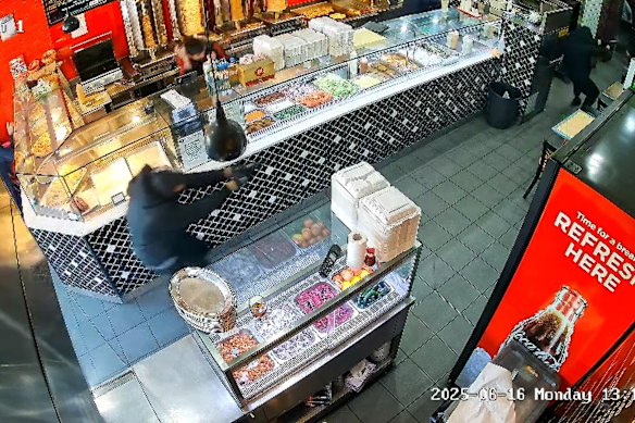 CCTV shows the shooting inside the Auburn restaurant.