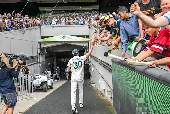 Pat Cummins thanks fans as he leaves the MCG after day five of the Boxing Day Test.