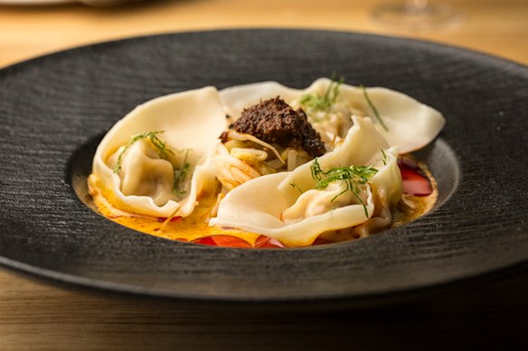 Laksa bombs: chicken and prawn dumplings in a rich laksa broth.