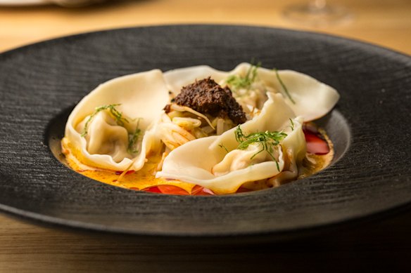 Laksa bombs – chicken and prawn dumplings in a rich laksa broth.