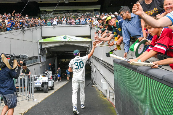 Pat Cummins thanks fans as he leaves the MCG after day five of the Boxing Day Test.