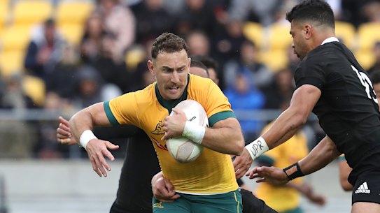 Nic White takes on the All Blacks.