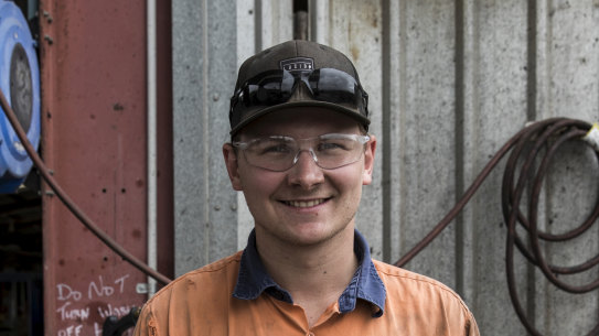 "I'm pretty cranky about it": Apprentice diesel mechanic Tom Stevens at work in Rockhampton.