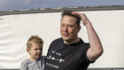 Elon Musk, pictured with his son X Æ A-XII last month, has shown only two things will make him restrict speech on the site: threats of jail and blocking.