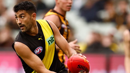 ELBOURNE, AUSTRALIA - MAY 14: Marlion Pickett of the Tigers
 runs with the ball during the round nine AFL match between the Hawthorn Hawks and the Richmond Tigers at Melbourne Cricket Ground on May 14, 2022 in Melbourne, Australia. (Photo by Darrian Traynor/AFL Photos/via Getty 