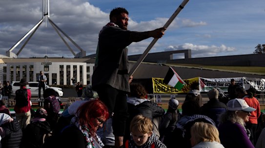 A pro Palestine protest takes place on the lawns in front of Parliament House ahead of the opening of the 48th Parliament.