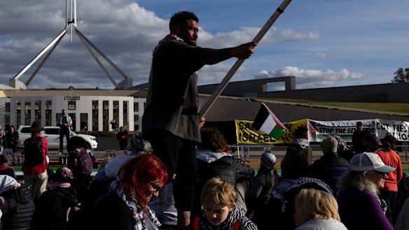 A pro Palestine protest takes place on the lawns in front of Parliament House ahead of the opening of the 48th Parliament.
