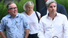 Alan Joyce with his husband Shane Lloyd arriving at Sydney Airport on Monday evening.