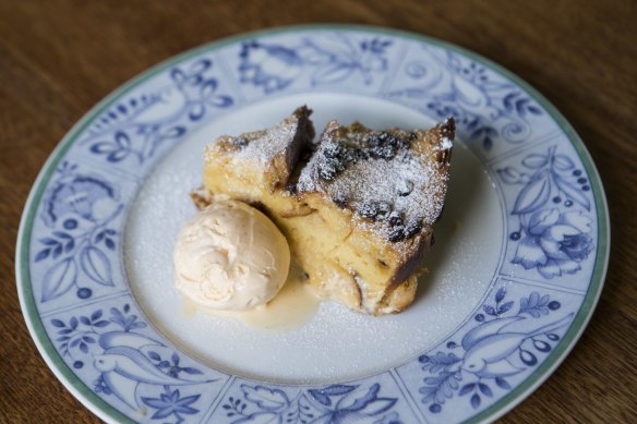 Bread and butter pudding with vanilla ice cream.