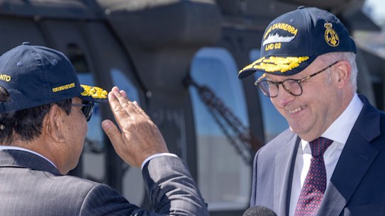 Indonesian President Prabowo Subianto and Prime Minister Anthony Albanese on the flight deck of HMAS Canberra in Sydney, where they announced a defence pact on Wednesday.