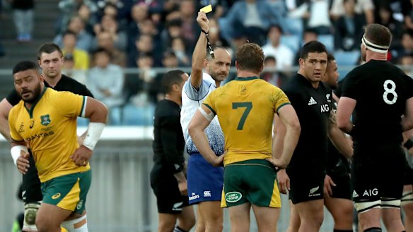 Marched: Tolu Latu is sent off against the All Blacks in Yokohama. The Wallabies will be hoping for better discipline from the hooker against Wales.