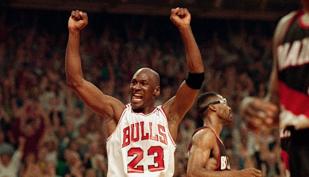 Michael Jordan celebrates the Bulls' win over the Portland Trail Blazers in the NBA Finals in Chicago in June 1992.