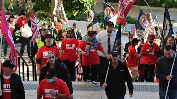 Star Brisbane casino workers have walked off the job on Friday and marched in protest of a pay offer.
