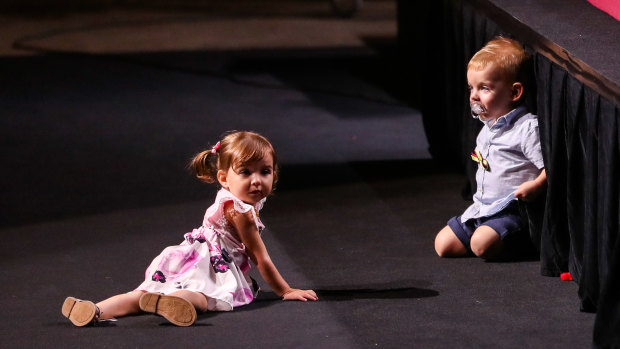 Charlotte, the daughter of deceased firefighter Andrew O’Dwyer, and Harvey, son of deceased deputy captain Geoffrey Keaton, at the memorial on Sunday. 