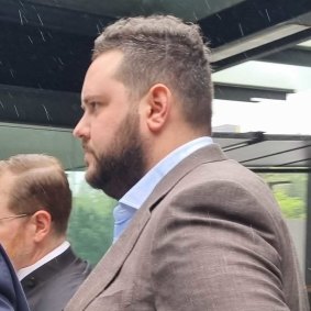 Kelvin Zachary Andrews leaves the Brisbane Magistrates Court after a magistrate ruled there was not enough evidence for his case to proceed to trial.