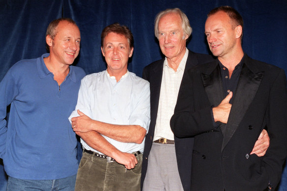  Mark Knopfler, Paul McCartney, George Martin and Sting at the fundraising concert for Montserrat in 1997.