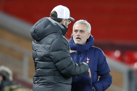 Jose Mourinho chats with Jurgen Klopp after the match.