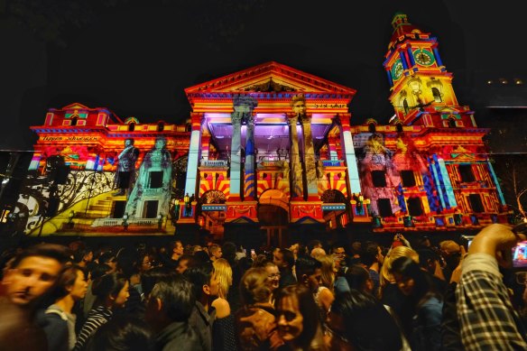 Melburnians take in the colours of the White Night festival.