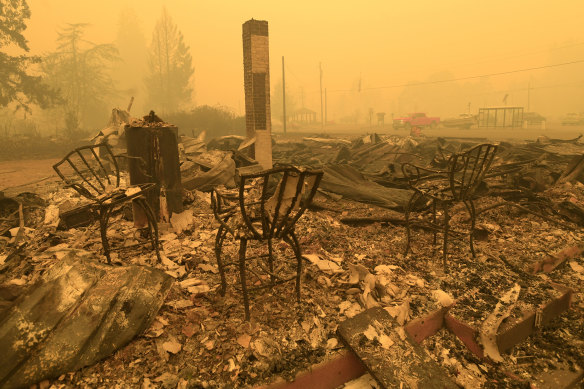 Three chairs are all that remain at the Gates Post office in Gates, Oregon. The post office was destroyed by bushfires along with several other buildings in the Santiam Canyon community.