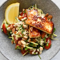 Simple ingredients star in this salad, which tops pearl cous cous, zucchini and almonds with halloumi.