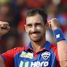 Delhi Capitals' Mitchell Starc celebrates the wicket of Sunrisers Hyderabad's Ishan Kishan during the Indian Premier League cricket match between Delhi Capitals and Sunrisers Hyderabad at ACAVDCA Cricket Stadium in Visakhapatnam, India, Sunday, March 30, 2025. (AP Photo/Surjeet Yadav)