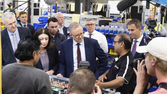 Then opposition leader Anthony Albanese visits the Brisbane factory of Tritium in April 2022, during the election campaign. 