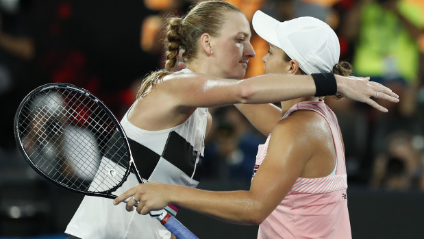 Ash Barty and Petra Kvitova embrace after their quarter-final match.