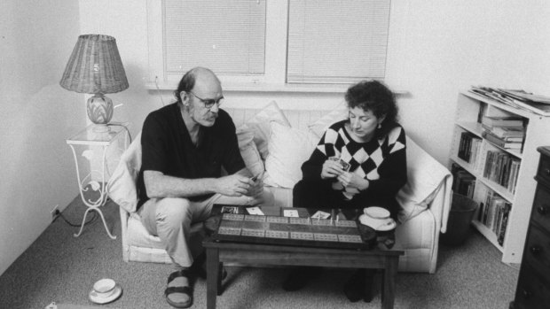 Margaret Atwood and Graeme Gibson playing cribbage.
