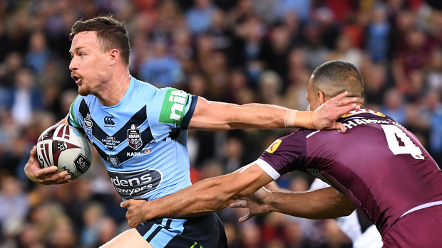 On the run: Damien Cook darts out of dummy half in Origin I.