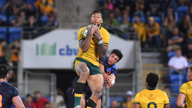 Israel Folau wins a high ball over Bautista Delguy from the Pumas on the Gold Coast. 