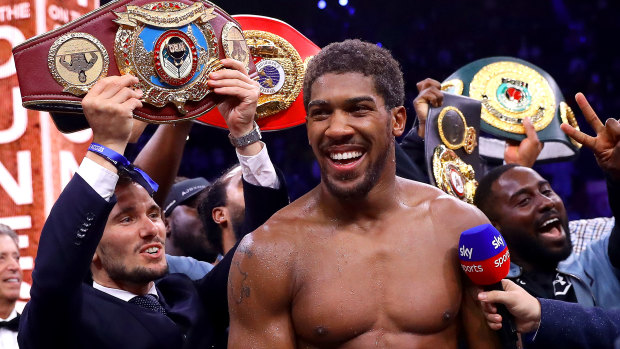 Joshua celebrates winning the so-called 'Clash on the Dunes' in Diriyah, Saudi Arabia.